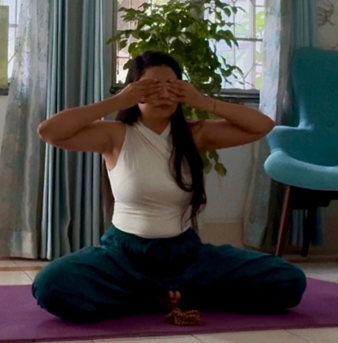 Major Smita Verma demonstrating a seated yogic practice